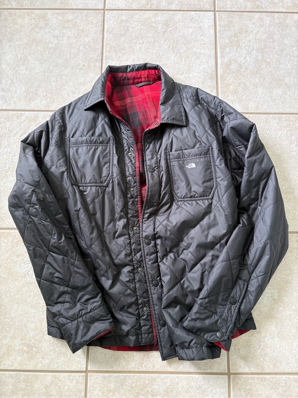 The North Face Reversible Jacket Men’s. Black and red/black plaid